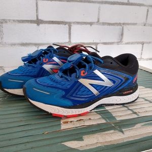 Boys New Balance 860 running shoes.